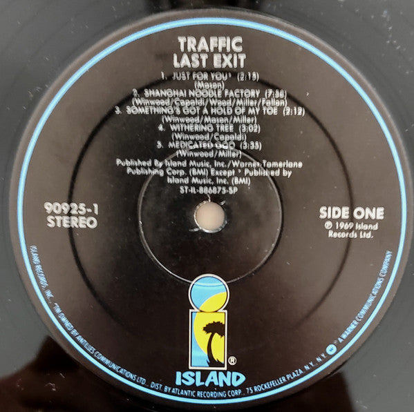 Image of Label Cover of 0625132E: LP - TRAFFIC, Last Exit (Island; 90925, US 1988 Reissue, Direct Metal Mastering) Has a cut-out strip top left. Light marks on the vinyl. VG/VG