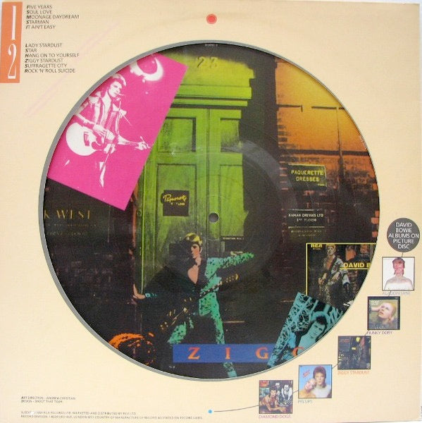 Image of Back Cover of LP - VG/G - DAVID BOWIE, The Rise And Fall Of Ziggy Stardust And The Spiders From Mars (RCA; BOPIC3, UK 1984 Reissue, Die Cut Sleeve, Limited Edition Picture Disc), NO insert, Lots of surface hairlines when held up to light, Sleeve intact but a bit grubby. , - 2316338C