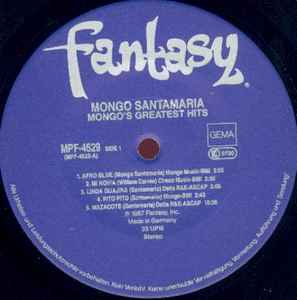 Image of Label Cover of LP - G+/VG+ - MONGO SANTAMARIA, Mongo's Greatest Hits (Fantasy; MPF-4529, Germany 1987 Reissue), Light hairlines only. Stain on bottom left of cover., - 1926057E