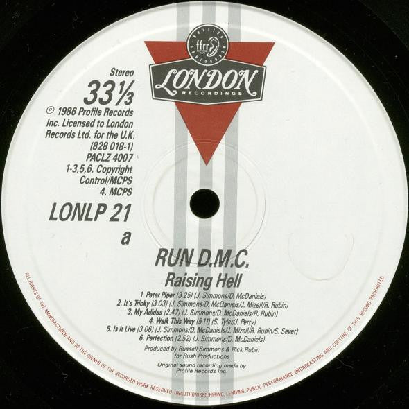 Image of Label Cover of LP - VG/VG - RUN DMC, Raising Hell (Profile; LONLP21, UK 1986), Light hairlines. Sleeve has edgewear, small split on top seam, small tear on opening section, remnants of sticker top right. , - 4426079E