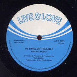 Image of Front Cover of 12" - /G+ - FREDDIE MCKAY / OSSIE, SLY & ROBBIE, In Times Of Trouble / Trouble Dub (Live And Love; LLDIS 204, UK 1982), Lots of light marks on either side that does cause noticeable surface noise across each side., - 3646305S