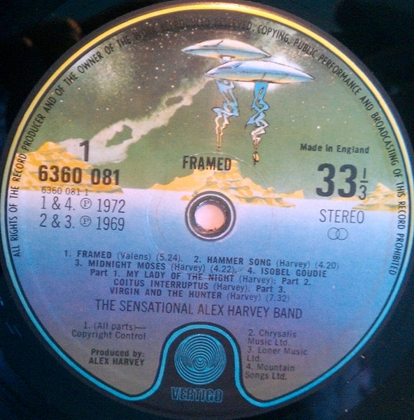 Image of Label Cover of 4645059S: LP - THE SENSATIONAL ALEX HARVEY BAND, Framed (Vertigo Spaceship; 6360081, UK 1973 Reissue, Gatefold Die Cut Slv, Misprint) Surface marks. Strong G+ sleeve, heavy edge wear, seam splitting to spine, ring wear, wear to die cut edges, creasing and staining/discolouration. G+/VG