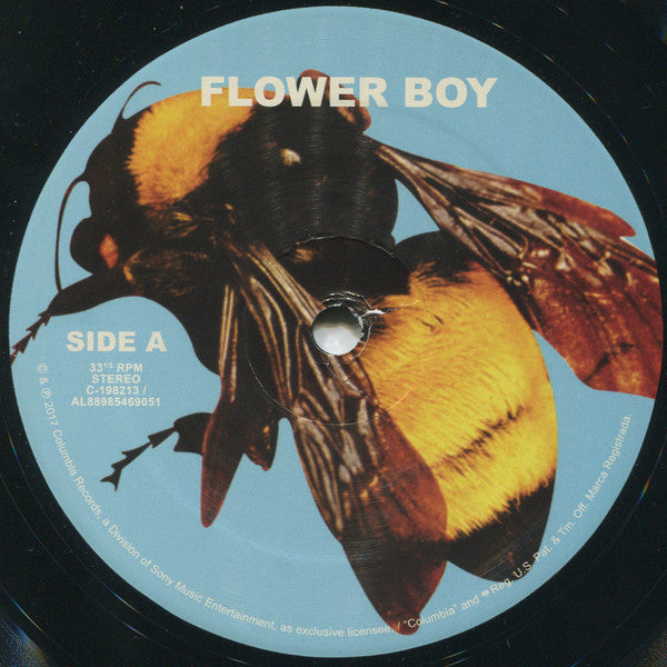Image of Label Cover of 2xLP - NEW/NEW - TYLER, THE CREATOR, Scum Fuck Flower Boy (Columbia; 88985469051, Europe 2017, Gatefold, Poster), , Tyler, the Creator's fourth studio album is Flower Boy (alternatively titled Scum Fuck Flower Boy). Flower Boy (2017) was released in conjunction with four singles: "Who Dat Boy" / "911," "Boredom," "I Ain't Got Time!" and "See You Again." Tyler decided to make Flower Boy a more personal project than his previous album, "Cherry Bomb." Critics praised the album for its s