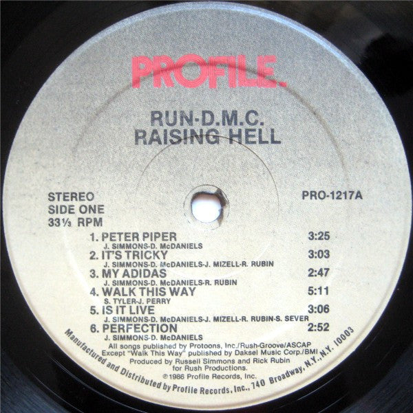 Image of Label Cover of 4745238S: LP - RUN DMC, Raising Hell (Profile Records; PRO1217, US 1986, Picture Sleeve, Green Front, blue back) Hairlines and scuffs, small promo notch cut on upper left, edge wear VG/VG