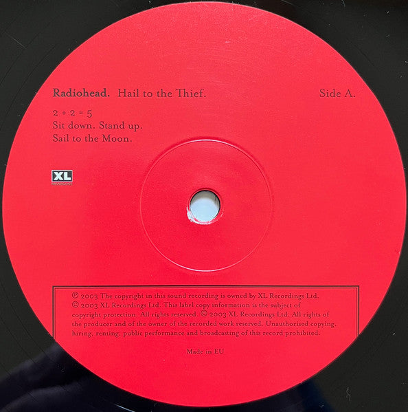 Image of Label Cover of 2xLP - NEW/NEW - RADIOHEAD, Hail To The Thief (XL Recordings; XLLP785, Europe 2022 Reissue, Gatefold, 2 Inners, 180 Gram Vinyl, Download Code), , Stunning sixth album from Oxford's finest sons. Moving slightly away from the heavy electronic influenced last two albums and back towards more intense numbers (a la 'OK Computer'). Angst filled love and hate songs. 'Hail To The Thief' is immersed in dread and paranoia, albeit a more visceral, emboldened dread and paranoia. This is one band