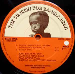 Image of Label Cover of 3xLP - VG+/VG+ - VARIOUS, The Concert for Bangladesh (Apple; STCX3385, UK 1972 Reissue, Box Set, Booklet, 3 Brown Inners, Auto-Coupled. Harrisongs Publishing Side One.), Clean copy, Small corner bump to box and one pen mark to rear, Otherwise nicely intact and still bright orange. Clean glossy discs and crisp booklet , - 4815084C