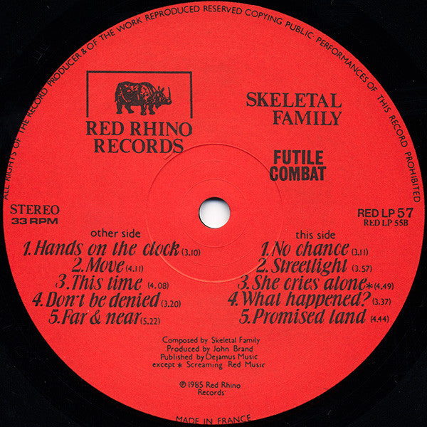 Image of Label Cover of LP - VG/VG - SKELETAL FAMILY, Futile Combat (Red Rhino Records; RED LP 57, UK 1985, Glossy Textured Sleeve), Strong VG - hairlines only. , - 2526440E