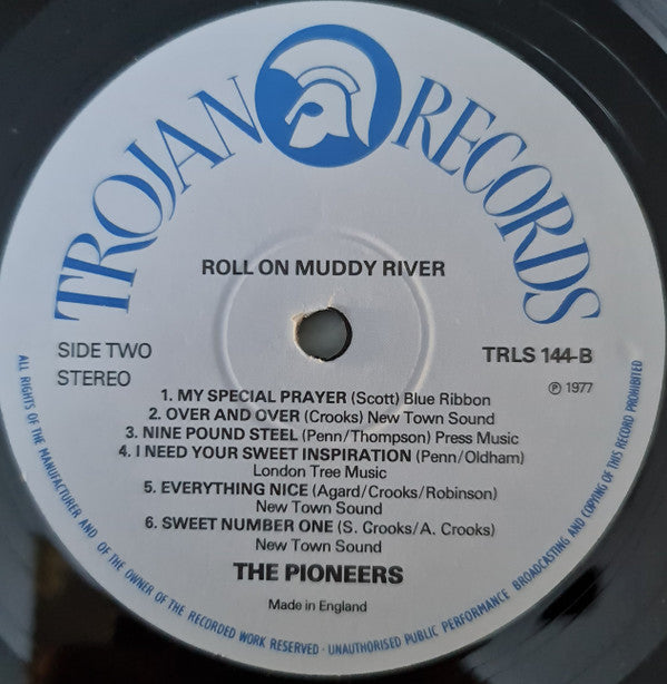 Image of Label Cover of LP - VG+/VG - THE PIONEERS, Roll On Muddy River (Trojan Records; TRLS 144, UK 1977, Laminated Sleeve), Quite a few scuffs on side B, plays fine. Nice looking sleeve., - 2426174E