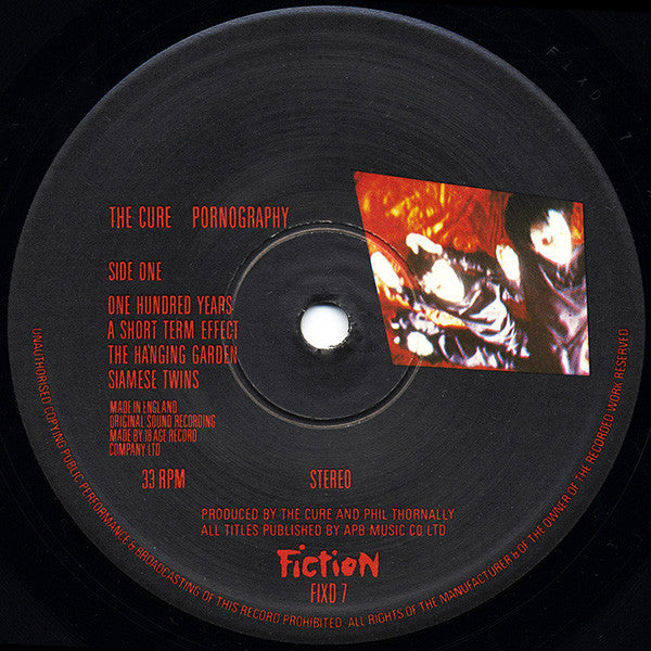 Image of Label Cover of LP - G+/G+ - THE CURE, Pornography (Fiction; FIXD7, UK 1982, No Inner), Heavy edge creasing, tears on bottom edge and along opening. Small patch of laminate bubbling. Light marks on record. Comes in Brent Library Service inner, - 1726504E
