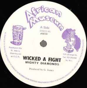 Image of Front Cover of 12" - /G+ - THE MIGHTY DIAMONDS , Wicked A Fight / Make Haste (African Museum ; AM04, Jamaica 1983, Purple Logo on White Label), Shows lots of light marks, plays like a decent VG, minor crackle only., - 0816112C