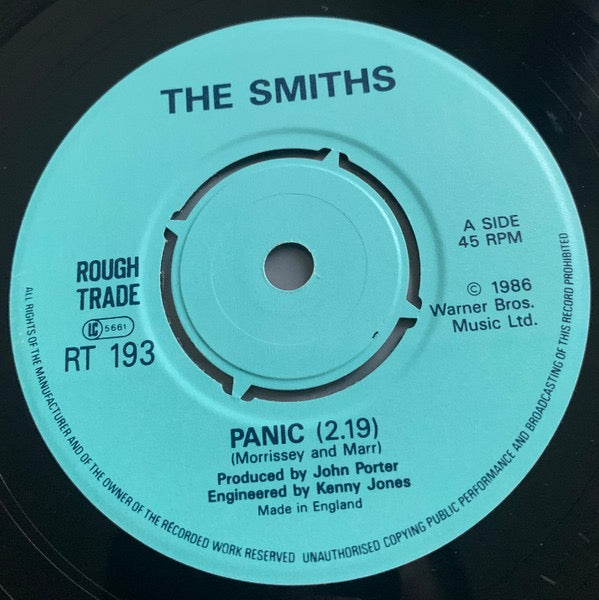 Image of Label Cover of 7" - VG/G+ - THE SMITHS, Panic (Rough Trade Push-Out Centre; RT 193, UK 1986, No Stickers, EMI Pressing), Old stamp on inside of sleeve opening. Hairlines across disc., - 4056084S