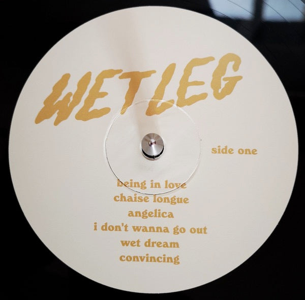 Image of Label Cover of LP - NEW/NEW - WET LEG, Wet Leg (Domino; WIGLP496, UK 2022, Insert, Download Code), , After releasing two of the hottest singles of 2020, Wet Leg s Rhian Teasdale and Hester Chambers were catapulted from their confines on the Isle of Wight to sold-out venues across the UK and packed-out tents at festivals causing giddy excitement wherever they went. Now, the duo unveil their debut album. Right from the start of Wet Leg , Teasdale and Chambers focus was fun, and a dry sense of humour
