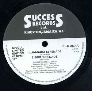 Image of Back Cover of 12" - /G+ - MILTON HENRY / MARQUES & RUPIE EDWARDS ALL STARS, What Can I Do / Jamaica Serenade (Success Records Ltd. ; SRLD 003, UK 1979), Lots of light hairline marks across each side of record. Plays with static, no pops, no skips, - 2846167S