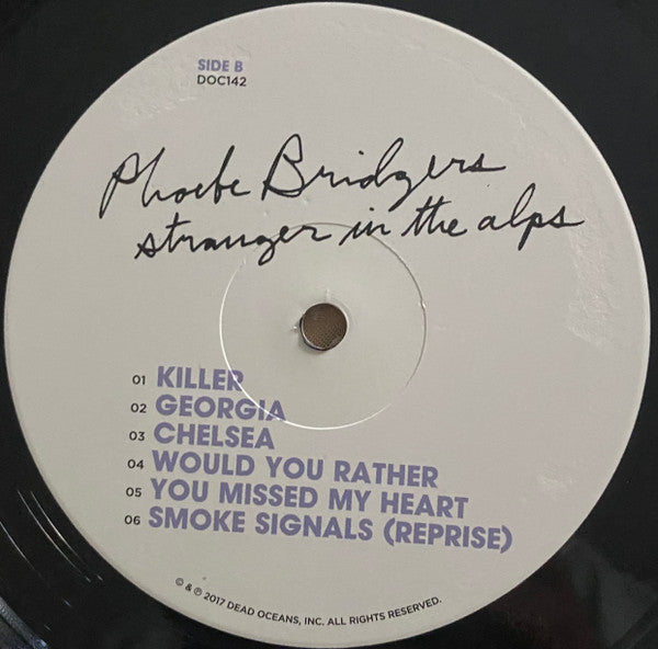 Image of Label Cover of LP - NEW/NEW - PHOEBE BRIDGERS, Stranger In The Alps (Dead Oceans; DOC142LP, US 2022 Reissue, Insert), , Phoebe Bridgers' album Stranger In The Alps features ten haunting, introspective songs, showcasing her unique voice and lyric writing perspective. The album explores personal experiences, with overt references to lost idols and incidents, but also evocative imagery. Bridgers believes her music comes from feeling and aims to be authentic in her songs. The album follows her 2015 sin