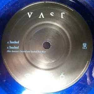 Image of Label Cover of 7" - VG+/VG+ - VAST, Touched (Mushroom; MUSH56S, UK 1999, Die-Cut Sleeve, Blue Translucent Vinyl.), Promo sticker on back of sleeve., - 2556070S