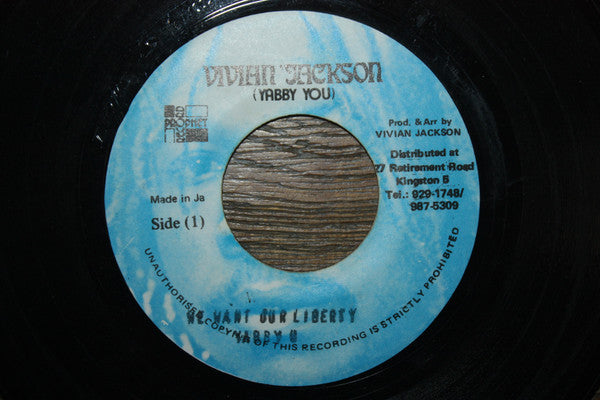 Image of Front Cover of 4915215C: 7" - LENROY SWABY / TRINITY, We Want Our Liberty / How Long Jah (Vivian Jackson (Yabby You); , Jamaica 1990s Reissue) Plays with light crackle from press, like all copies /VG