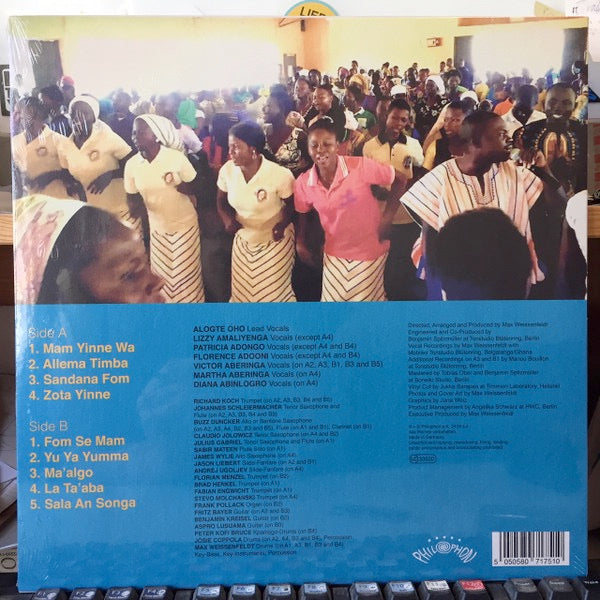 Image of Back Cover of LP - NEW/NEW - ALOGTE OHO & HIS SOUNDS OF JOY, Mam Yinne Wa (Philophon; PH33005, Germany 2019), , Alogte Oho is the number one Frafra gospel artist from within the explosive music scene of Bolgatanga in Northern Ghana. He is accompanied by his powerful female choir, the Sounds of Joy, comprised of Lizzy Amaliyenga, Patricia Adongo and Florence Adooni - all fantastic gospel performers in their own rights. - 2736076E