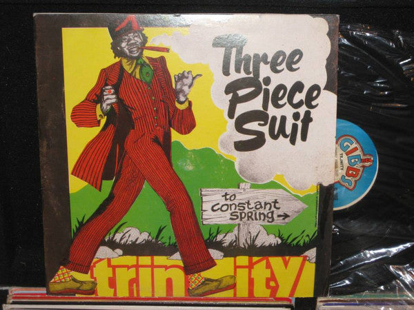Image of Label Cover of 3524073E: LP - TRINITY, Three Piece Suit (Joe Gibbs Record Globe; none, 1995 Reissue, Picture Sleeve) Strong VG all round/ Light marks & scufs/dint. Edgewear/minor creasing/foxing. VG/VG
