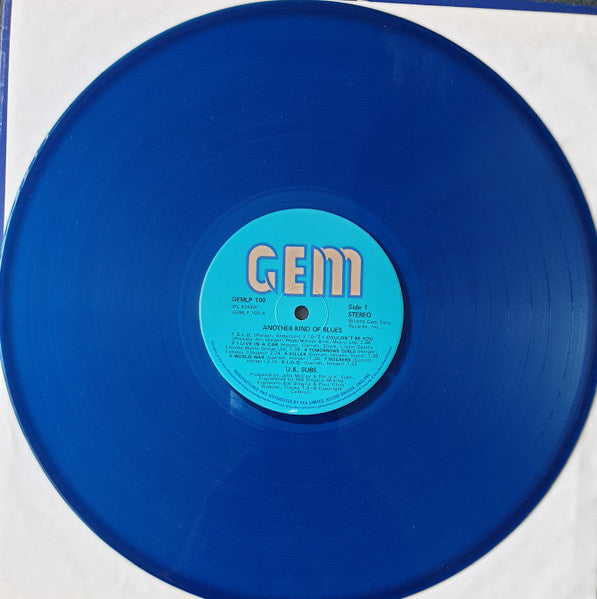 Image of Label Cover of LP - VG/G+ - U.K. SUBS, Another Kind of Blues (Gem; GEMLP 100, UK 1979, Inner, Blue Vinyl, 1st pressing of 20,000), Ring Wear, Slight Sticker Damage, - 2726168E