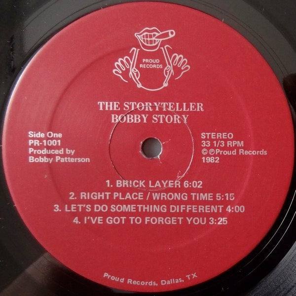 Image of Label Cover of 4114440C: LP - BOBBY STORY, The Storyteller (Proud Records; PR-1001, US 1982) Record very slightly dished � doesn't affect play. Sleeve worn at edges (top edge split), corners, spine. A very small rip on reverse near bottom; general wear and scuffs VG/VG