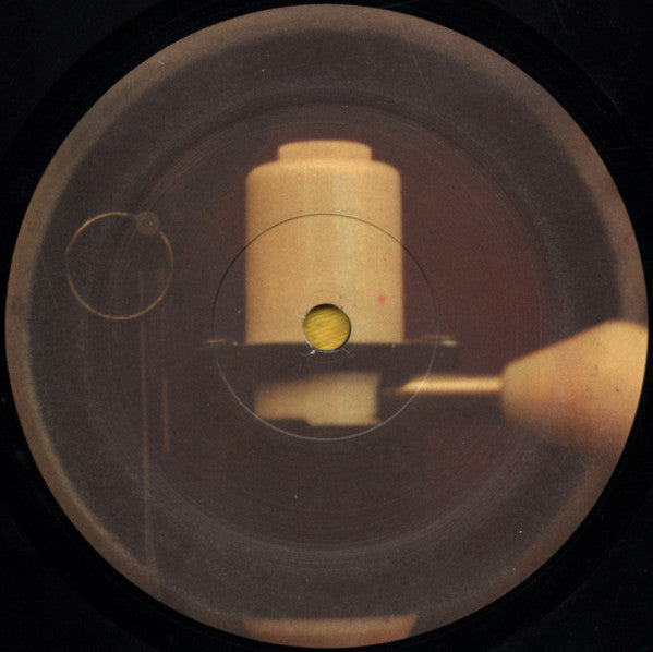 Image of Back Cover of LP - /VG - DJ SHADOW & CUT CHEMIST, Brainfreeze (Sixty 7 Recordings; V-SD 1001, US 2001), Light marks on the disc. , "A nonstop live mix of strictly 45's and exercise in vinyl destruction" - 4426055E