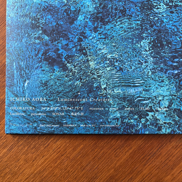 Image of Label Cover of LP - NEW/NEW - ICHIKO AOBA, Luminescent Creatures (Hermine; HERM003LP, Europe 2025, Poster), , To listen to Ichiko Aoba is to be drawn into a world as intimate as a warmly lit home, but cosmic in scale. The Japanese singer, songwriter, composer, and multi-instrumentalist, has taken a dedicated online fanbase built from TikTok sounds and critically acclaimed, and translated that into international tours spanning more than 20 countries. She was well known in Japan collaborating with ar