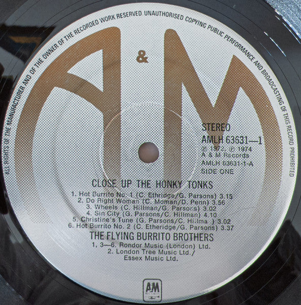 Image of Label Cover of 3345026S: 2xLP - THE FLYING BURRITO BROS, Close Up The Honky Tonks (A&M Records; AMLH 63631, UK 1974, Gatefold) A few light marks. Sticker damage and pen marks to top right corner of sleeve, creasing, ring and edge wear. G+/VG+