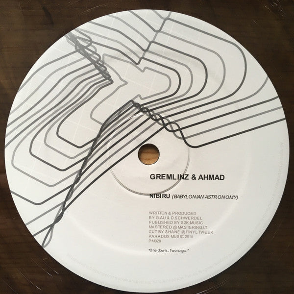 Image of Label Cover of 4615752C: 12" - GREMLINZ & AHMAD, Nibiru (Babylonian Astronomy) / The Orchid (Paradox Music; PM028, UK 2013, Die Cut Company Sleeve, Smoke Translucent Vinyl) Sleeve lightly scuffed and worn VG/VG+
