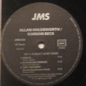 Image of Label Cover of LP - VG/VG - ALLAN HOLDSWORTH - GORDON BECK, With A Heart In My Song (JMS.; JMS 044, France 1988), Strong VG. Light surface marks. Light edge wear, creasing, faint ring wear and indents., - 0646006S