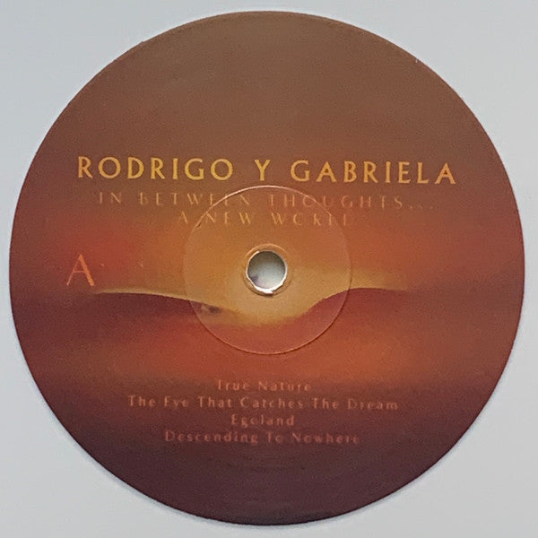 Image of Label Cover of LP - VG+/EX - RODRIGO Y GABRIELA, In Between Thoughts . . . A New World (ATO Records ; ATO0621, US 2023, Poster, White "Bone" Vinyl, Signed "Rod" And "gab" On Front Sleeve In Silver Pen), SIGNED, - 0626336E