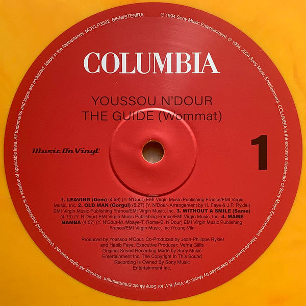 Image of Label Cover of 2xLP - VG/VG+ - YOUSSOU N'DOUR, The Guide (Wommat) (Music On Vinyl; MOVLP3502, Netherlands 2024 Reissue, Insert, Orange Vinyl), Sleeve has scuffs and creases, - 0716387C