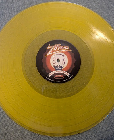 Image of Label Cover of LP - NEW/NEW - THE ZUTONS, Tired of Hanging Around (Sony; 19958408061, Europe 2026 Reissue, Gatefold, Limited Edition Transparent Yellow LP), , - 1056099S