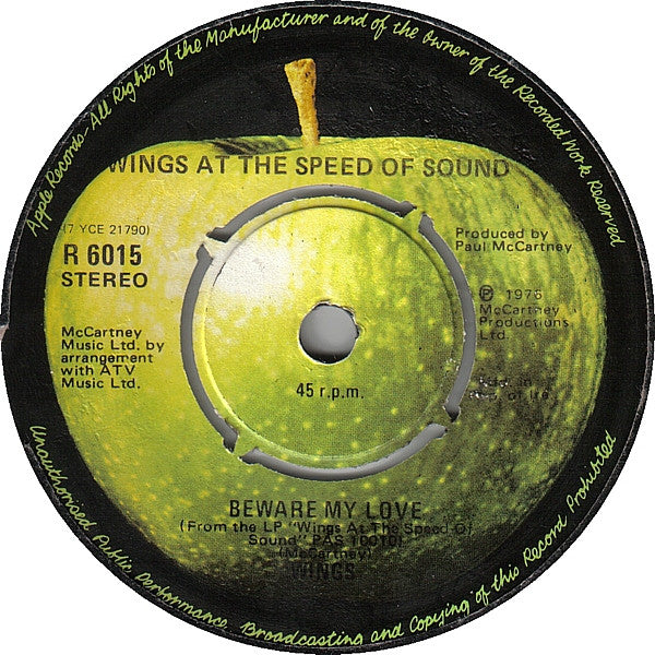 Image of Back Cover of 7" - F/G+ - WINGS, Let 'Em In (Apple Records; R 6015, Ireland 1976, Company Sleeve, Irish pressing with reversed Apple labels.), WOL., - 1256006S