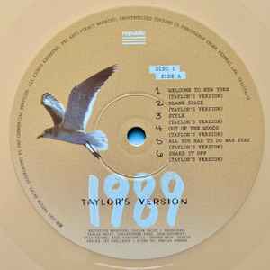 Image of Label Cover of 2xLP - EX/EX - TAYLOR SWIFT, 1989 (Taylor's Version) (Republic Records; 0245554218, Worldwide 2023, Gatefold, 2 Inners, Tangerine Vinyl, Optimal Media GmbH pressing), Stickered Plastic Outer Sleeve, - 2426133E