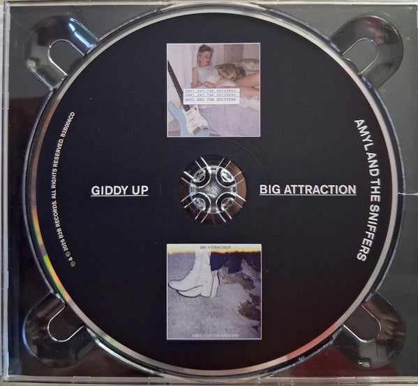 Image of Label Cover of CD - NEW/NEW - AMYL AND THE SNIFFERS, Giddy Up / Big Attraction (10 Year Anniversary) (Virgin; B2B006CD, UK 2026), , Ten years ago, in a shared house on Chapel Street, four20-year-olds with zero expectations wrote and recorded anEP in a single afternoon. Those six blistering minutes ofmusic became Giddy Up . An hour later, Amyl and TheSniffers had a name and the beginnings of a legacy. As Amy recalls: We recorded and wrote over theafternoon we d never played together before that d