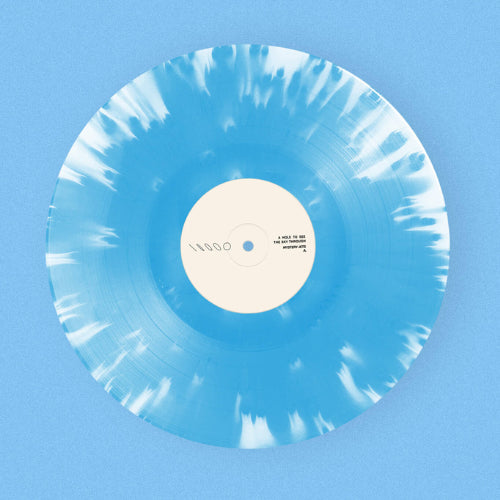 Image of Label Cover of LP - NEW/NEW - MYSTERY JETS, A Hole To See The Sky Through - Dinked Edition (Fiction Records; Jets7003, UK 2026, Blue & White "Sky Burst" Vinyl, Limited Pressing of 1,000, Dinked Edition No. 414, "See The Sky" perforated peep hole sleeve with blue sky printed inner.), , Mystery Jets return with A Hole To See The Sky Through , a conceptually rich new album that acts as the inward-facing counterpart to Curve of the Earth , shifting focus from vast external landscapes to the intimate