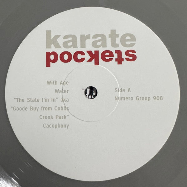 Image of Label Cover of LP - NEW/NEW - KARATE, Pockets (Numero Group; NUM908LP-C1, Europe , Inner & Insert, Opaque Grey Vinyl), , Karate s defiant and final studio album punctuates a 12-year discography that spanned harDCore-style catharsis to feedback-saturated improv. This 04 classic skipped the Friendster migration for back-tobasics songwriting suffused with jazz phrasings and beat-inspired lyricism. Featuring Codeine/Come guitarist Chris Brokaw, Pockets is remastered from the original analog tapes and