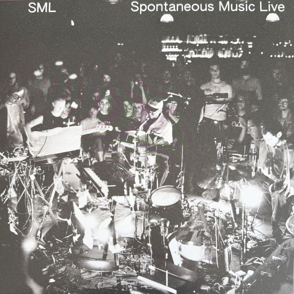 Image of Front Cover of LP - NEW/NEW - SML, Spontaneous Music Live (International Anthem; IARC112LP, Europe 2026, Inner), , Spontaneous Music Live contains two side-length pieces of unedited improvisation, recorded live at Los Angeles venue Zebulon during SML's December 2025 three-night residency, just weeks after the release of the band's second album HOW YOU BEEN. It was recorded and mixed live to stereo tape by Bryce Gonzales (the same engineer/wizard known for his gorgeous live captures/mixes of Jeff Pa