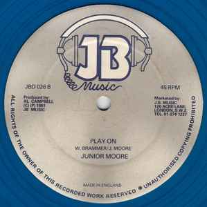 Image of Back Cover of 12" - /G+ - JUNIOR MOORE, Play On Reggae Music / Play On (JB Music; JBD 026, UK 1981, Plain Sleeve, Blue Vinyl), Marks on disc. Plays well. WOL. Ringwear., - 2226072E