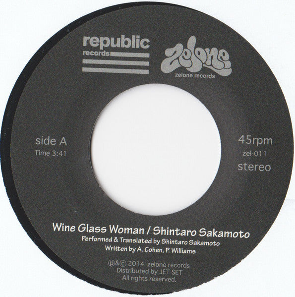 Image of Label Cover of 7" - VG/G - MAYER HAWTHORNE / SHINTARO SAKAMOTO, In A Phantom Mood / Wine Glass Woman (Zelone Records; zel-011, Japan 2014, Picture Sleeve, Insert), Record fogged and has lots of storage marks. Plays well considering though. Stickered outer plastic sleeve, - 2316381C