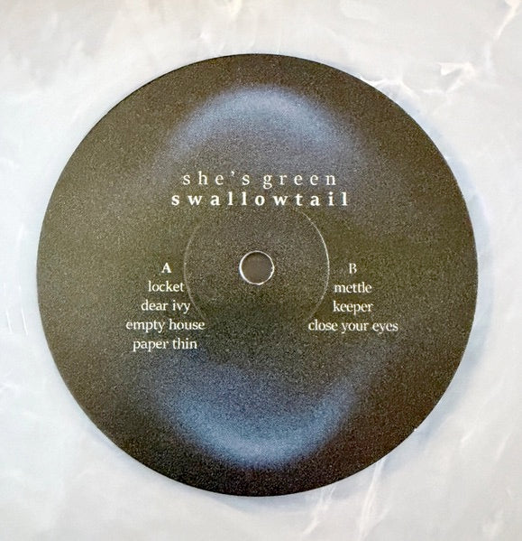 Image of Label Cover of 2xLP - NEW/NEW - SHE'S GREEN, Swallowtail / Chrysalis (Photo Finish Records; 5547990366, UK 2026, Gatefold, Insert, Iridescent White Vinyl), , This LP release is the combination of the swallowtail and chrysalis EPs from Minneapolis quintet she s green (Zofia Smith, Liam Armstrong,Raines Lucas, Teddy Nordvold and KevinSeebeck), known for their ethereal soundscapes and captivating live performances. Self-described as moss music , she s green aim to create their own musical and vis