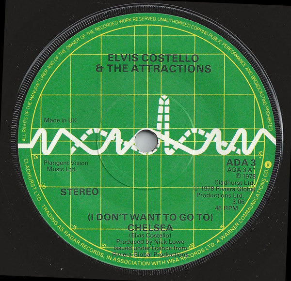 Image of Label Cover of 7" - VG/VG - ELVIS COSTELLO AND THE ATTRACTIONS, (I Don't Want To Go To) Chelsea (Radar Records; ADA 3, UK 1978, Picture Sleeve, Signed By Elvis And Three Attractions), SIGNED, Edge Wear, - 2526487E