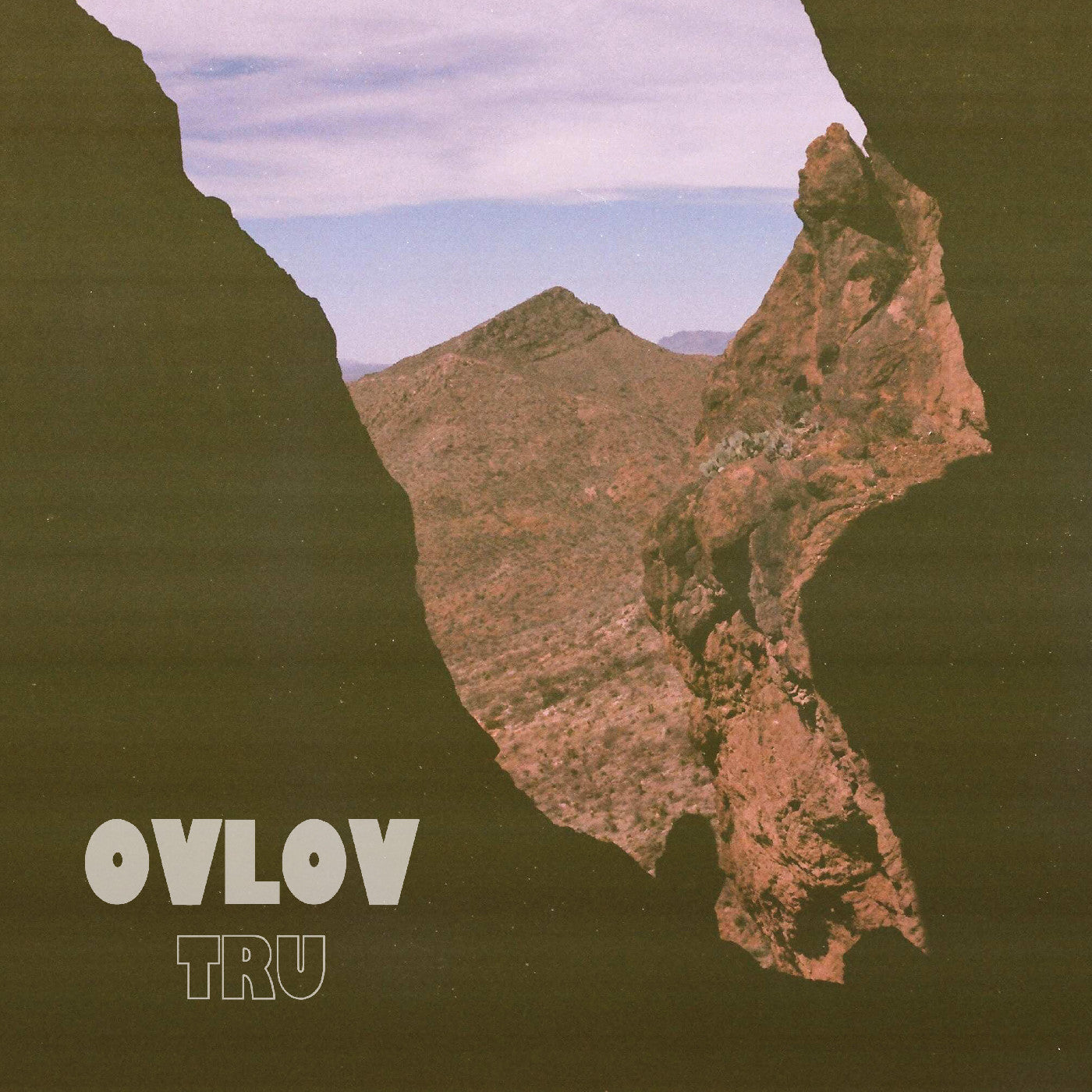 Image of Front Cover of LP - NEW/NEW - OVLOV, Tru (Exploding In Sound Records; LPEIS080C3, Europe 2026 Reissue, Red Ripple Vinyl), , Compared to its 2013 predecessor, Am, TRU is less late-’80s Dino Jr., more early-’90s Sebadoh: While Ovlov are still as wonderfully wooly ever, they’re unleashing the noise in more purposeful, sculpted spurts and displaying a greater willingness to let their melodies sparkle through the clouds of distortion. Tuneful, feedback-slathered surges like “Half Way Fine” and “Spright”