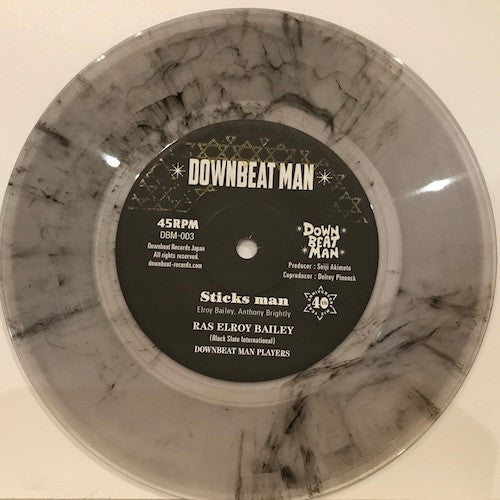 Image of Front Cover of 7" - /VG+ - RAS ELROY BAILEY, DOWNBEAT MAN PLAYERS, Sticks Man (Downbeat Man; DBM-003, Japan 2016, Clear Vinyl), , - 2916397C