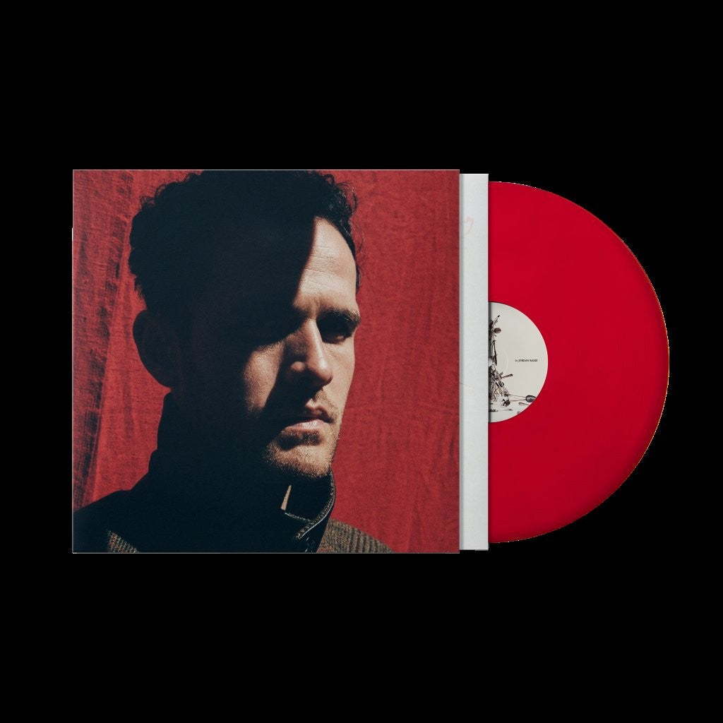 Image of Front Cover of LP - NEW/NEW - JORDAN RAKEI, A Safe Place To Be Wild (Fontana; 5780434, UK 2026, Indies Exclusive Red Vinyl with Alternative Cover Art), , A Safe Place To Be Wild is the seventh LP from Jordan Rakei, arriving after more than a decade of pushing the boundaries of soul, jazz and alternative R&B. Fearless, intimate and emotionally direct, the album finds Jordan embracing uninhibited self-expression and placing vulnerability at the centre of his songwriting. Stripping everything back to