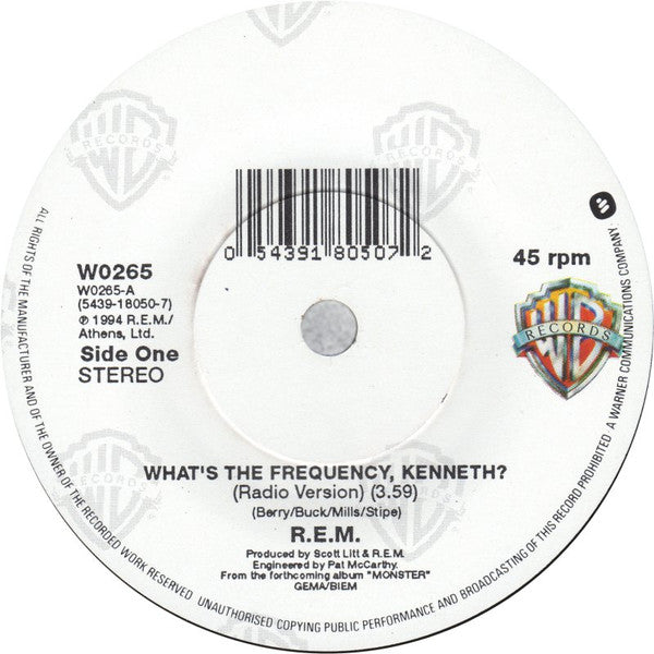 Image of Label Cover of 7" - VG/VG+ - R.E.M., What's The Frequency, Kenneth? (Warner Bros. Records; W0265, UK 1994, Picture Sleeve), , - 3016230C