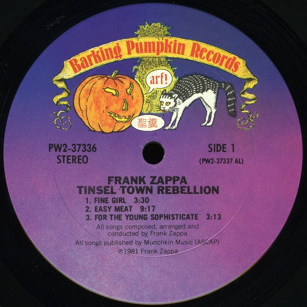 Image of Label Cover of 2xLP - VG/VG - FRANK ZAPPA, Tinsel Town Rebellion (Barking Pumpkin Records; PW2 37336, US 1981, Gatefold, 2 Inners, Santa Maria Pressing), Inners are split. Sleeve has a large cut out., - 3316060C