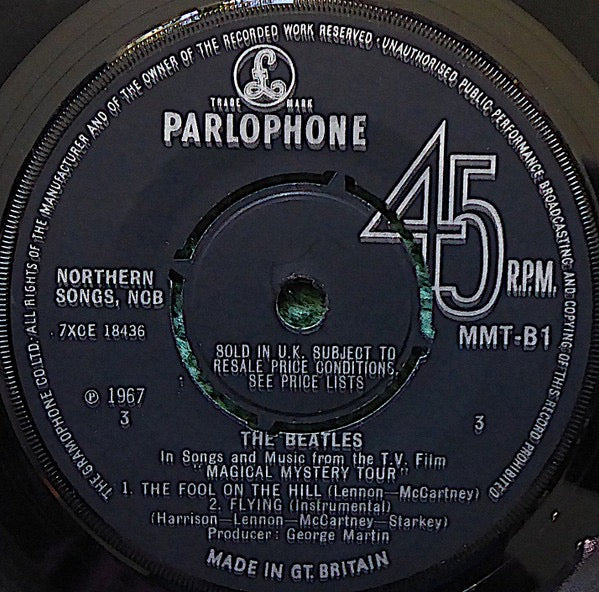 Image of Label Cover of 2x7" EP - VG/VG+ - THE BEATLES, Magical Mystery Tour (Parlophone ; MMT 1, UK 1967, Gatefold With Stapled In Booklet, Blue Lyric Sheets, Mono, Push Out Centres, Label Variation; Year Printed Directly Above Side Indicator On Second Disc Only), Clean glossy discs, Sleeve a little sunfaded and has an old shop stamp on inside cover , - 3316517C