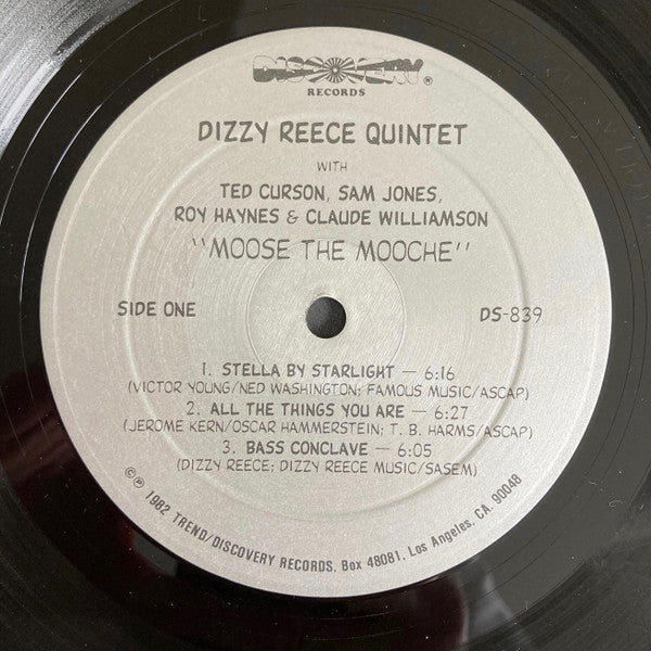 Image of Label Cover of LP - G+/VG - DIZZY REECE QUINTET, Moose The Mooche (Discovery; DS-839, US 1982 Reissue), Record has mainly storage scuffs. Sleeve worn, scuffed, stained; with drill hole at corner, split top seam, damage along spine, and stickers / sticker damage on front, - 2716245C