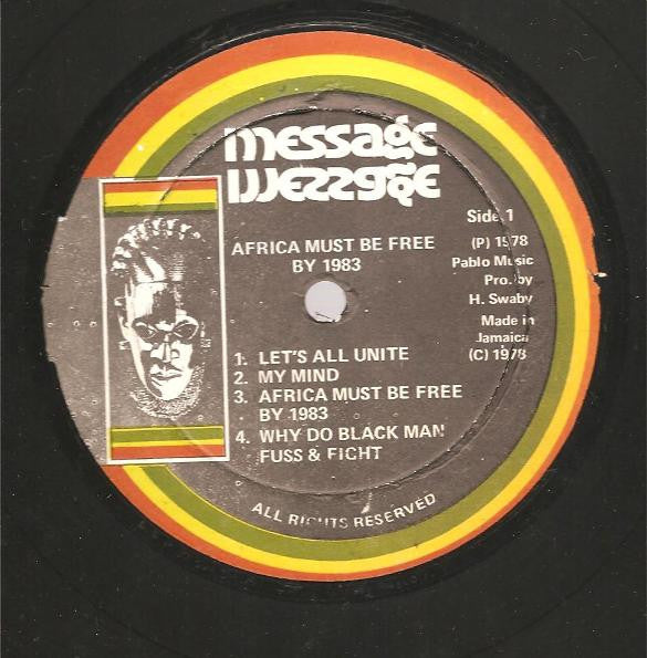Image of Label Cover of LP - VG/VG+ - HUGH MUNDELL, Africa Must Be Free By 1983 (Message; , Jamaica 1978), Shiny clean, light background from JA press. Tiny biro on front sleeve, good looking still., - 3626324E
